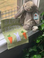 Bunny with Tea Towel from Mangel Florist, flower shop at the Drake Hotel Chicago
