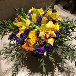 Compact Purple and Yellow Arrangement  from Mangel Florist, flower shop at the Drake Hotel Chicago
