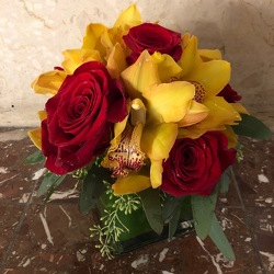 Red and Yellow Orchid Cube from Mangel Florist, flower shop at the Drake Hotel Chicago