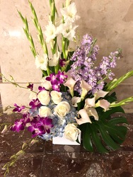 Soft Purple and Blue Sympathy Spray from Mangel Florist, flower shop at the Drake Hotel Chicago
