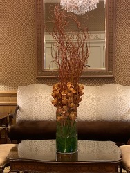 Tall Willow and Orchid Arrangement from Mangel Florist, flower shop at the Drake Hotel Chicago
