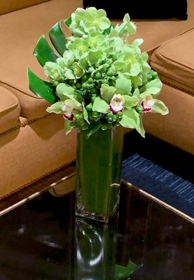 Medium Orchid and Hellebore Arrangement  from Mangel Florist, flower shop at the Drake Hotel Chicago
