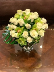 White Roses with Green Cymbidium Orchids from Mangel Florist, flower shop at the Drake Hotel Chicago