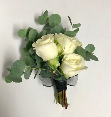 Boutonniere from Mangel Florist, flower shop at the Drake Hotel Chicago